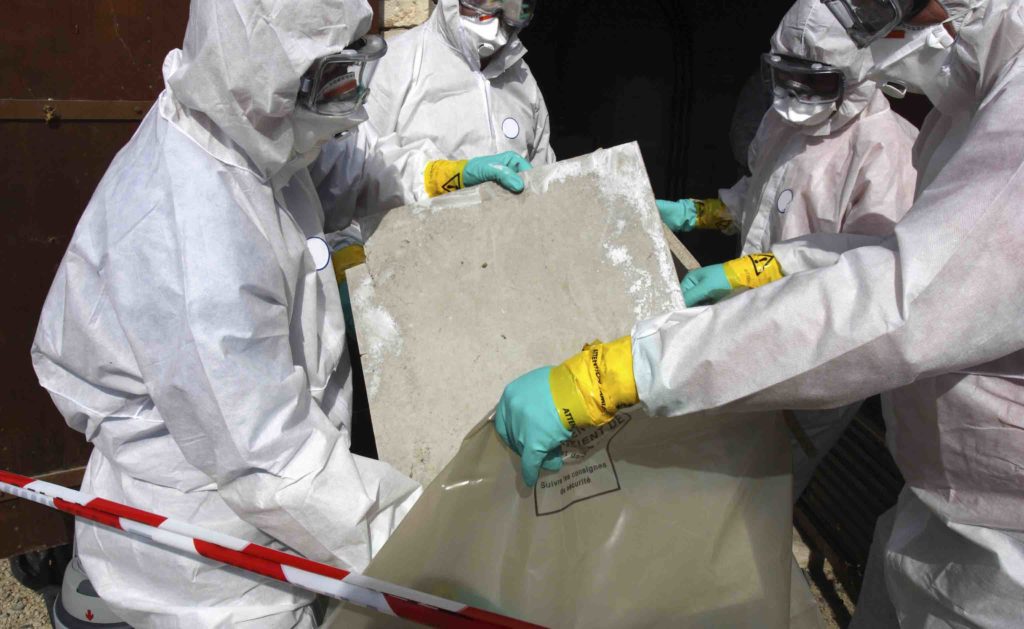 Removing materials containing some asbestos